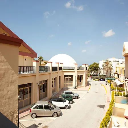 In Steps From Sandy *